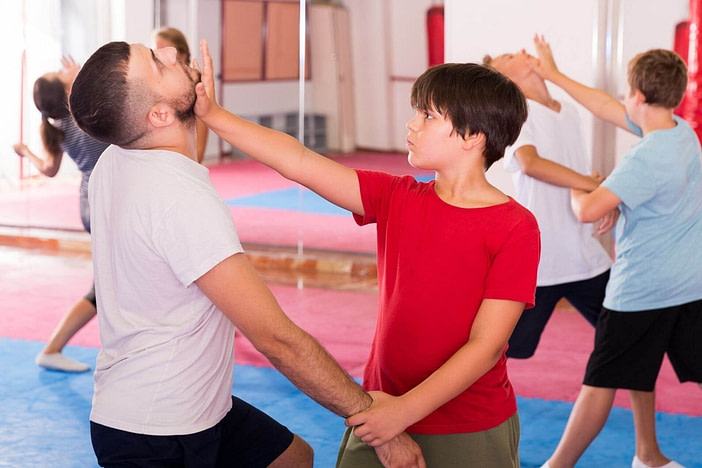 Kids practicing self-defense why they need martial arts training in today's world